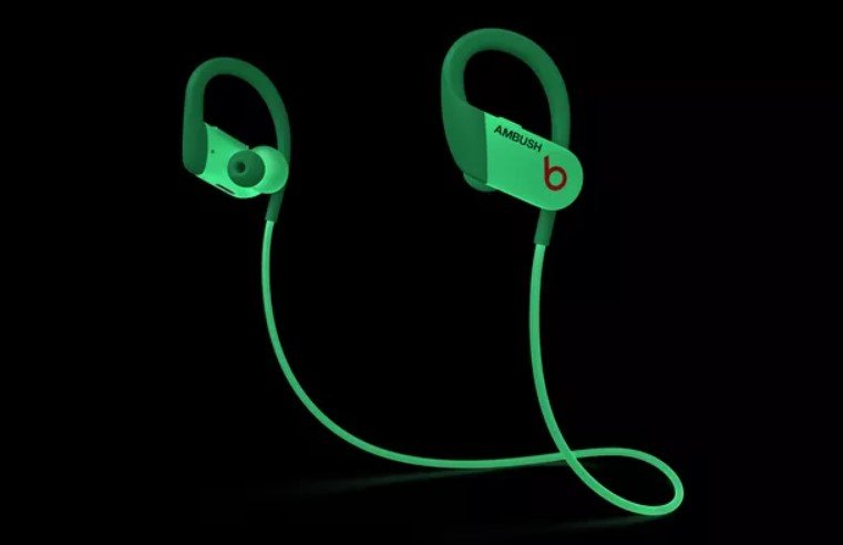 Get noticed with the glow-in-the-dark Powerbeats Bluetooth earphones